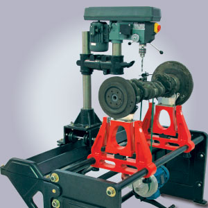 Perforadora rebatible